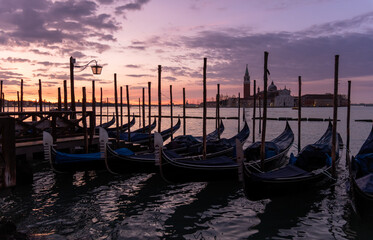 Amazing sunrise on the Grand Canal in Venice.The Church San Giorgio Maggiore on the background