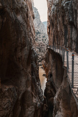 Equipped tourist trail along steep edge of cliff above narrow mountain gorge, Caminito del Rey, Spain
