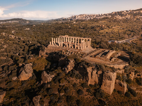 Ancient greek Tempio di Giunone ruins in Valle dei Templi on sunny day, Agrigento, Sicily, Italy