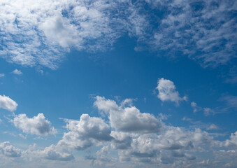 Sky is blue and clear with no clouds. The sky is very bright and the sun is shining. Blue sky with scattered white clouds creating a serene and peaceful atmosphere. Ideal for backgrounds, nature theme