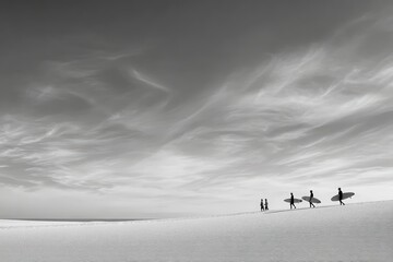 Monochrome image of surfers walking on a sandy beach under dramatic sky, black and white photography capturing adventure sport and lifestyle, scenic seascape