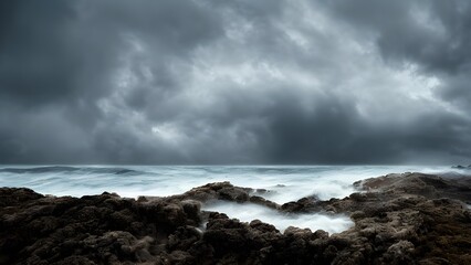 Obraz premium A dramatic seascape with stormy clouds gathering over the turbulent ocean, crashing waves against the rocky coast