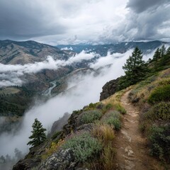Mountain Trail Cloudscape Hiking path overlooking misty river valley