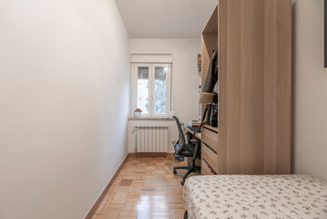 Kid's room with a themed wardrobe in pastel colors and fun prints for the little ones