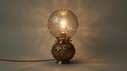 Obraz premium Soft illumination flows from an elegant lamp, perfect for evoking warmth and light.