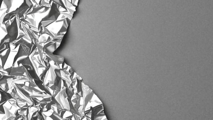Silver foil paper corner showcasing rough texture and abstract design