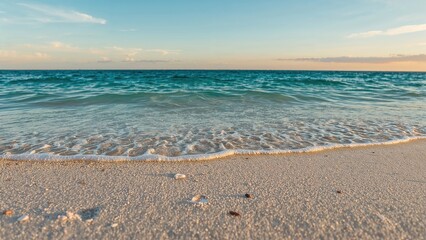 Fototapeta premium Calm Azure Sea Ripples on Evening Coast