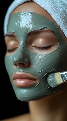 Fototapeta premium Person enjoying facial mask and beauty treatment in a relaxing and rejuvenating spa setting 