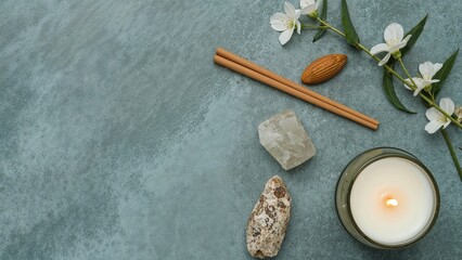 Mindfulness and spirituality banner featuring a smudge stick, incense, healing crystal, and candle from above, with space for text