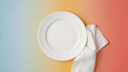 Top-down view of a clean white plate resting on a fabric mat with ample room for decoration.