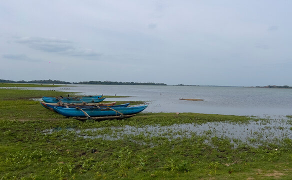 boat on a lake parakrama samudraya in sri lanka 