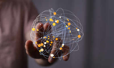 Person's hand interacts with a digital sphere, representing global network connections and data visualization.