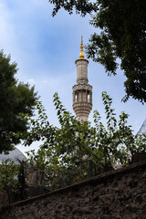 istanbul, besiktas 04.09.2025: The minaret of the small Mecidiye Mosque is visible in this photograph taken from the slopes of the Beşiktaş district in Istanbul. Ottoman architectural style. Design. 