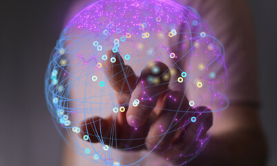 Abstract image of a hand interacting with a digital sphere representing global network connection and data flow.