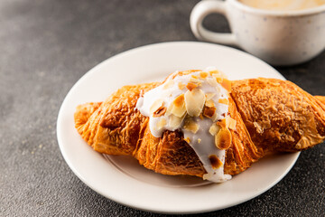 Croissant almond freshly baked sweet dessert tasty snack fresh delicious gourmet food background on the table  rustic food top view copy space