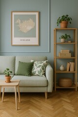 Serene living room with a light green sofa, wooden shelving, and a framed map of Iceland, evoking a calm and natural ambiance.
