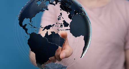 Person touching interactive digital globe, representing global network, communication, and technology.