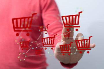 Person interacting with digital shopping carts.  E-commerce, online retail, digital marketing.
