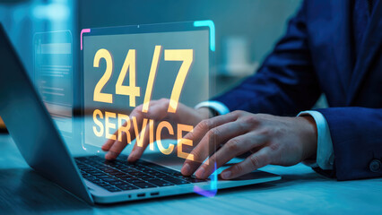 Professional utilizing 24/7 service support on laptop, ensuring seamless customer assistance anytime