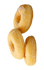 Side view of three brown sugar glazed cinnamon donuts in stack isolated on white background with clipping path