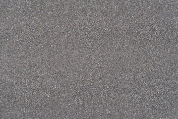 Natural seamless gray stone granules texture, gravel aggregate surface background