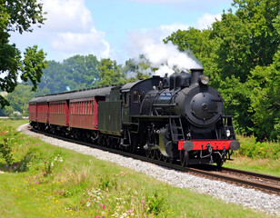 Obraz premium Steam Train Countryside Journey.
