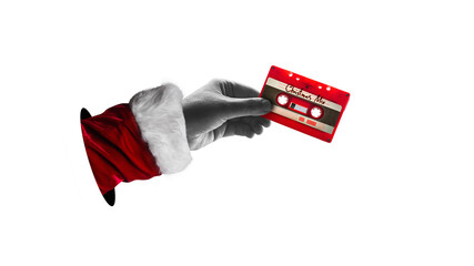 A santa claus hand holding audio cassette, isolated on free png background. Vintage red music...