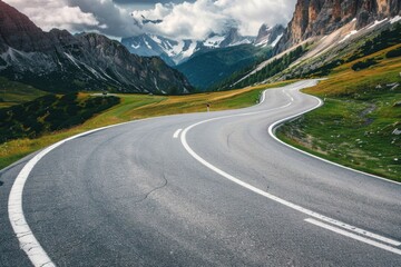 Fototapeta premium Winding mountain road during cloudy afternoon in the Dolomites region of Italy