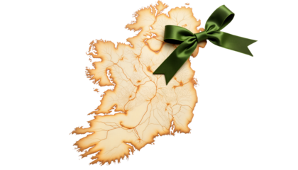 Antique map of Ireland with green bow tied around it for St. Patrick's Day  