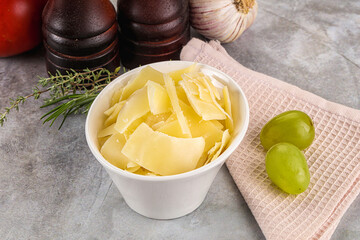 Parmesan cheese slices in the bowl