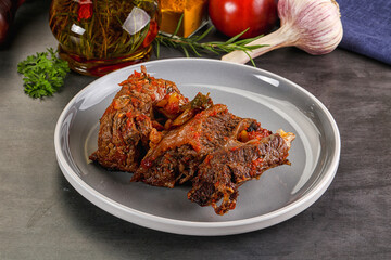 Baked beef ribs with vegetables