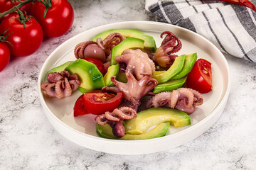 Salad with baby octopus and avocado