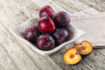 Ripe sweet juicy plum heap