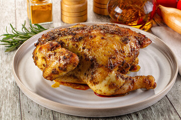 Baked in oven whole chicken with spices
