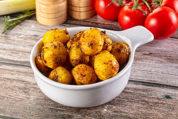 Baked small baby potato with herbs