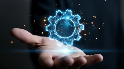 A digital gear hovers above an open hand against a dark background - Powered by Adobe