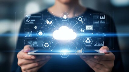 Person holding tablet displaying cloud with digital icons and data visualization - Powered by Adobe