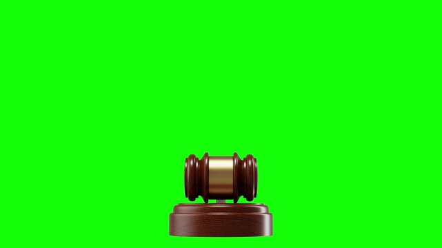 Judge's gavel on a green chroma key backdrop, suitable for keying and visual effects