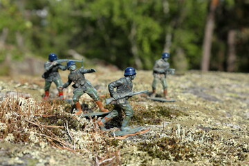 Naklejka premium German WW2 toy soldiers. Playing outside in nature. Close up and isolated, blurred background.
