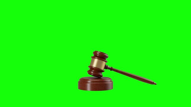 Wooden gavel on a green screen, perfect for keying into legal related videos or animation projects