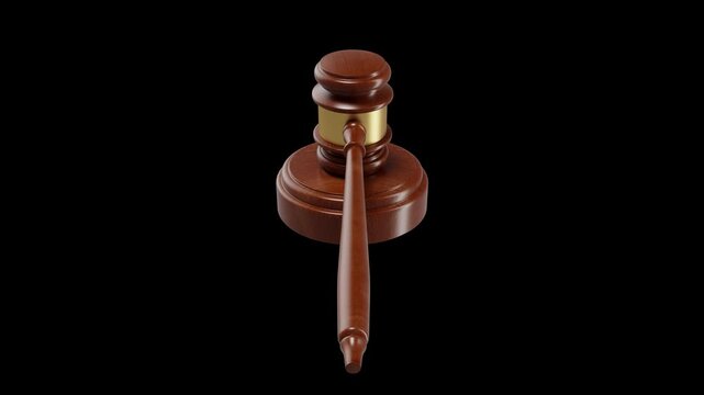 High-resolution close-up of wooden judge gavel with base on black background, perfect for legal themes.