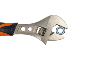 Adjustable wrench held with a metal nut on a transparent background