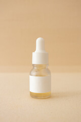 Serum bottle on beige canva background organic natural skincare beauty product mockup, minimal aesthetic