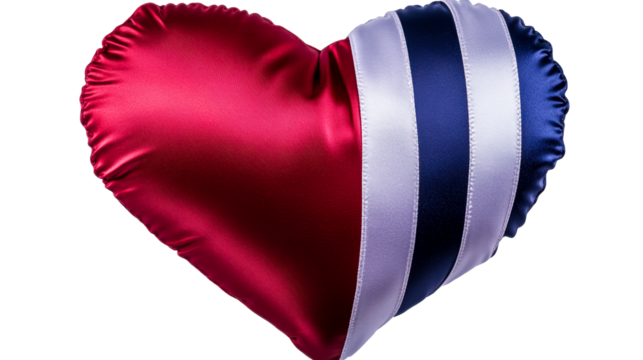 Heart shaped pillow with red blue and white striped ribbon