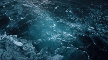 A mesmerizing aerial view showcases a vast expanse of swirling clouds and atmospheric formations, creating an abstract and visually captivating composition with dynamic textures.