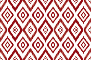 Seamless Red White Ikat Pattern – Bold tribal ethnic geometric design inspired by traditional weaving, great for fabrics, holiday décor, wallpapers, and surface pattern design.
