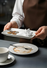 Restaurant Waiter Clearing Table After Meal Service Clean Plates Food Service Professional