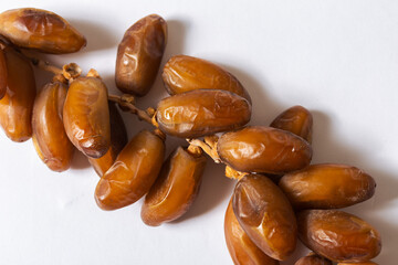 Fresh Organic Dates on White Background