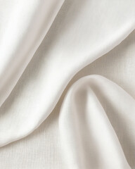 Flowing white linen fabric texture background, elegant drapery with soft folds