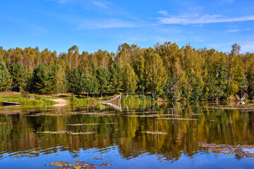 Tranquil River Reflections of Autumn Trees